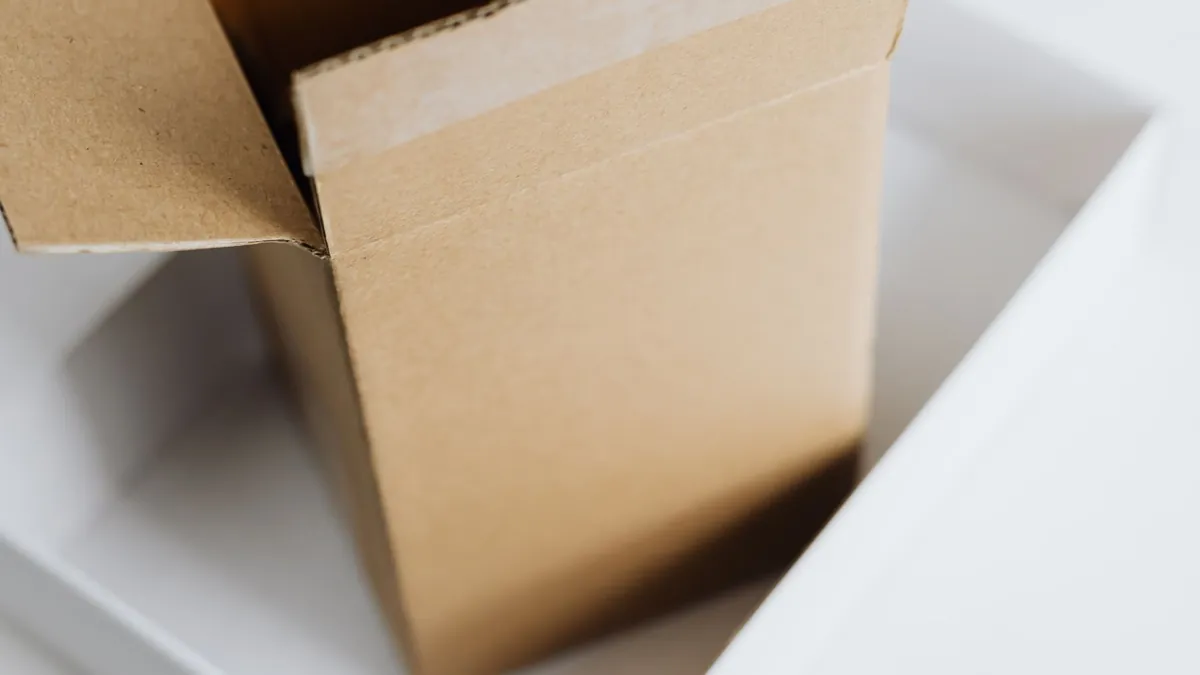 A stack of plain cardboard parcels