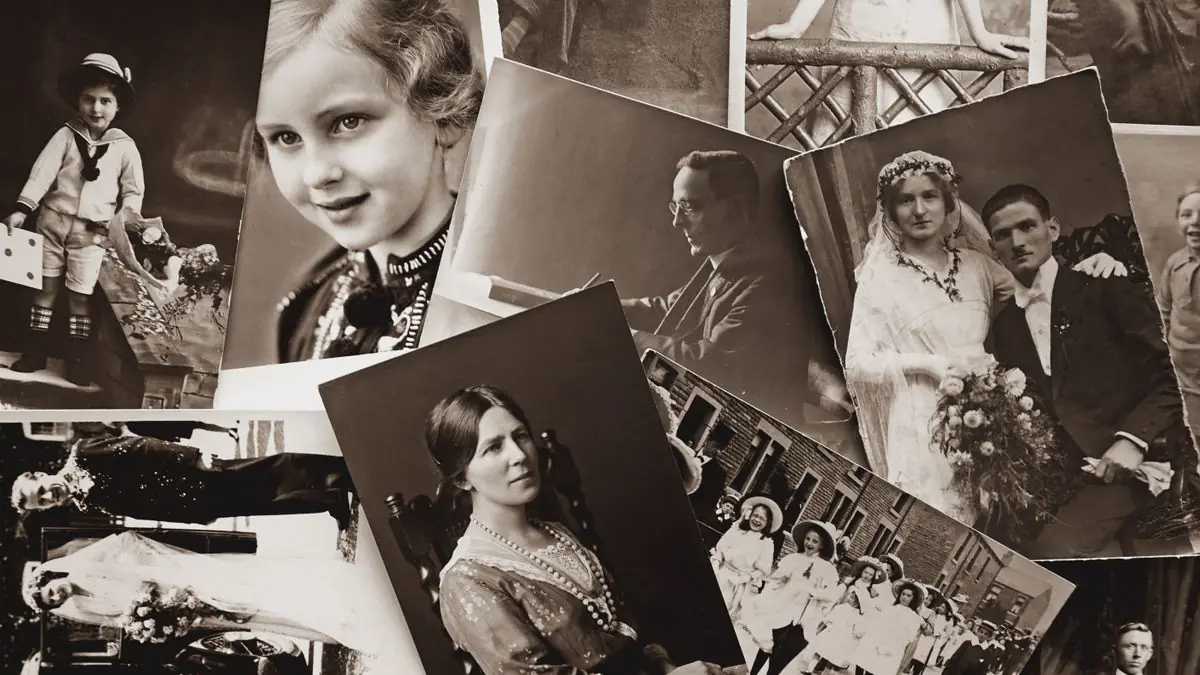 A spread of old sepia family photographs